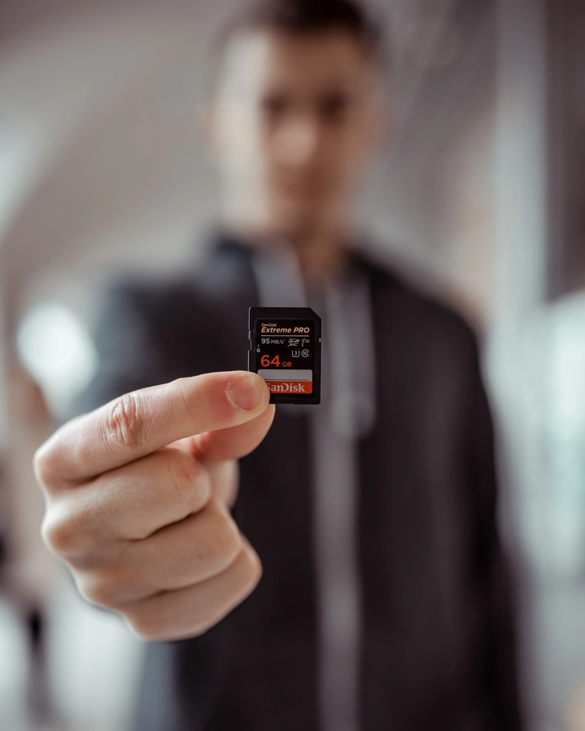 Person holding SD card
